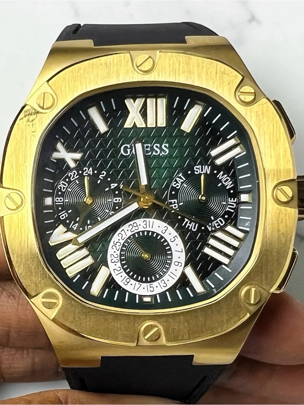 GUESS Gold Tone Case with Green Dial and Black Strap Watch